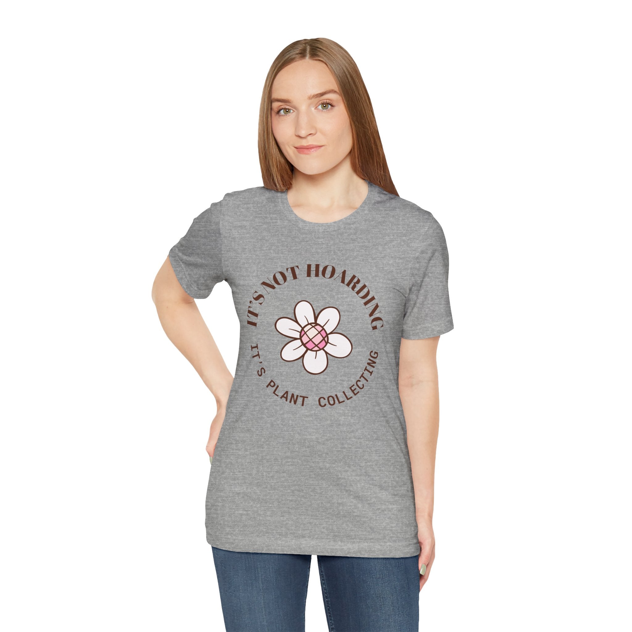 a woman wearing a tee shirt with text that says "It's not hoarding, it's plant collecting"