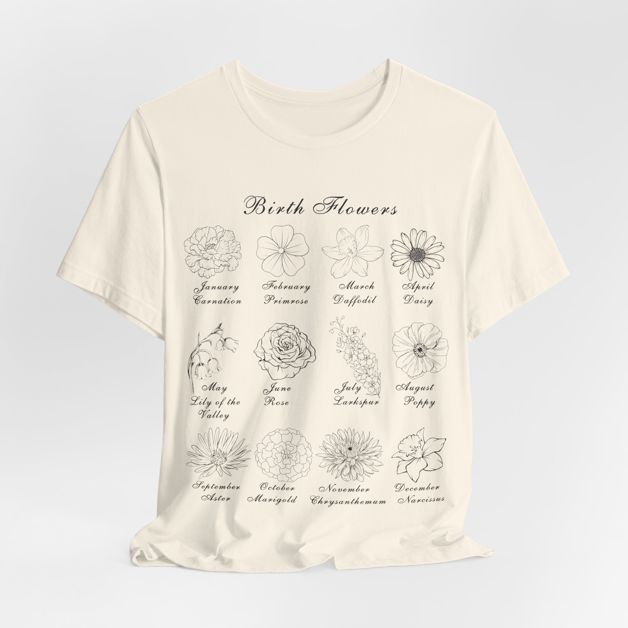 A tee shirt in a natural colored tone and a printed design of birth flowers.  Each month of the year is printed with a corresponding flower for that particular month.  The t-shirt has a crew neck and short sleeves.  It is also lightweight so it's perfect for layering.  It also makes an excellent birthday, Mother's Day, Valentine's Day or Christmas gift.