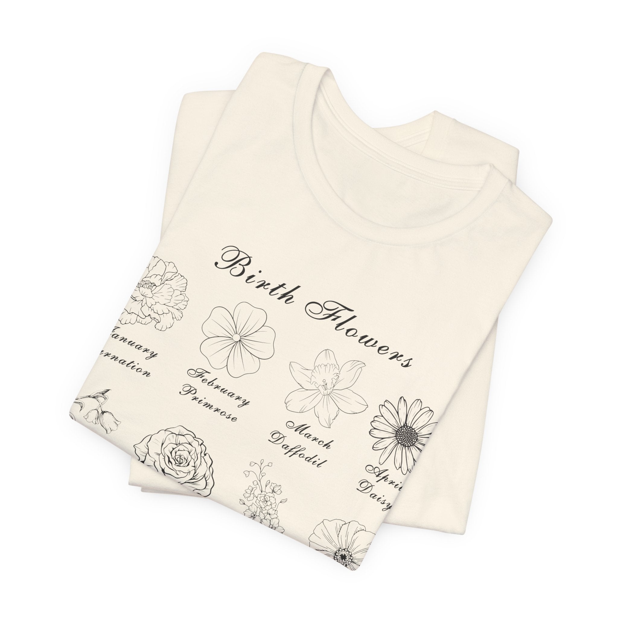 A folded tshirt in a natural colored tone and a printed design of birth flowers.  Each month of the year is printed with a corresponding flower for that particular month.  The t-shirt has a crew neck and short sleeves.  It is also lightweight so it's perfect for layering.  It also makes an excellent birthday, Mother's Day, Valentine's Day or Christmas gift.