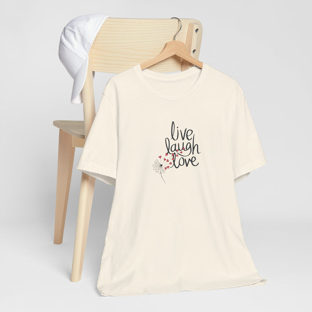 a graphic tee with text that says "live, laugh, love," and a dandelion with hearts.