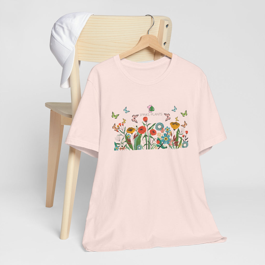 A soft pink gardening shirt for houseplant parents