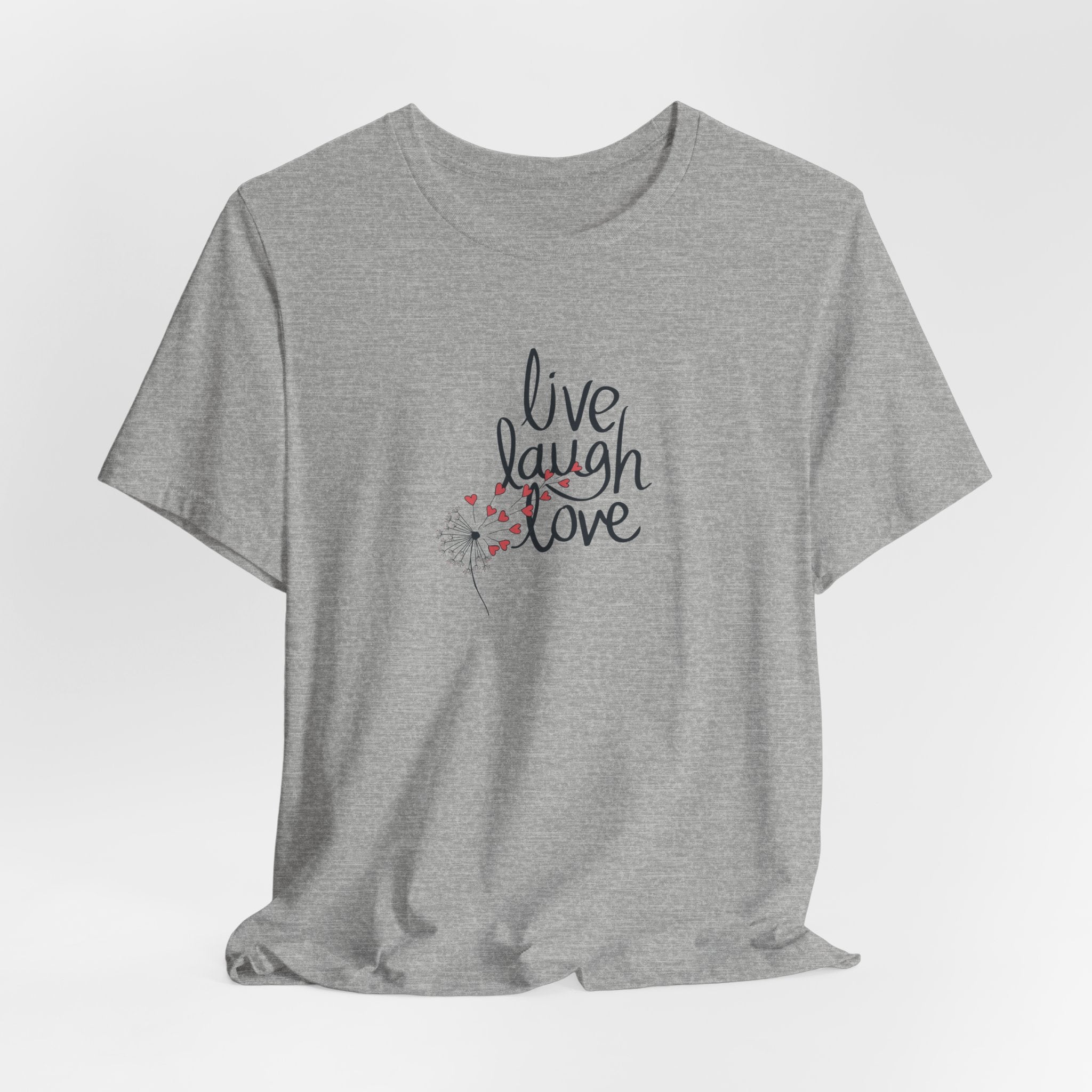 A top with text that says "live, laugh, love," and a dandelion with hearts.