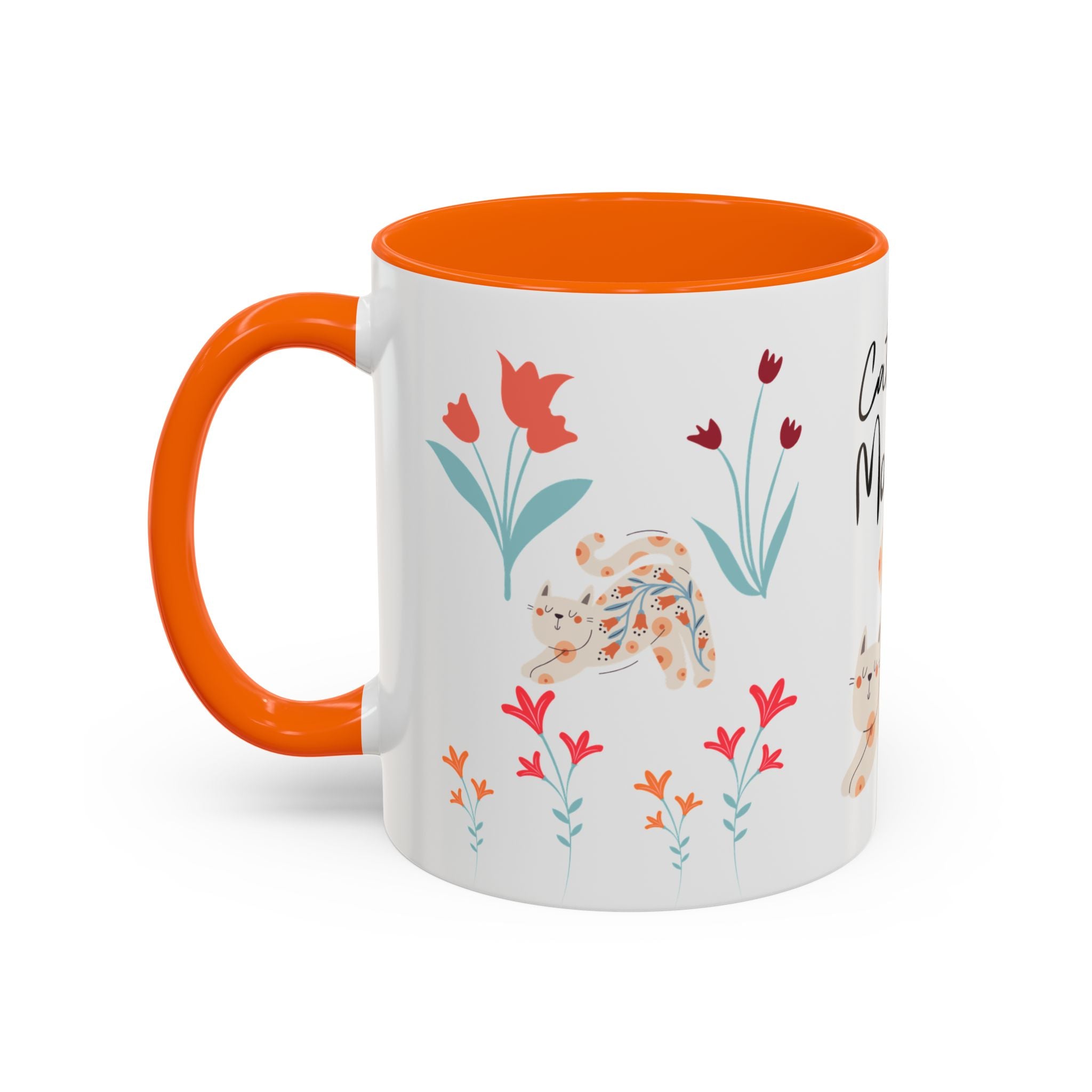 Mug with orange handle and floral design on a white background