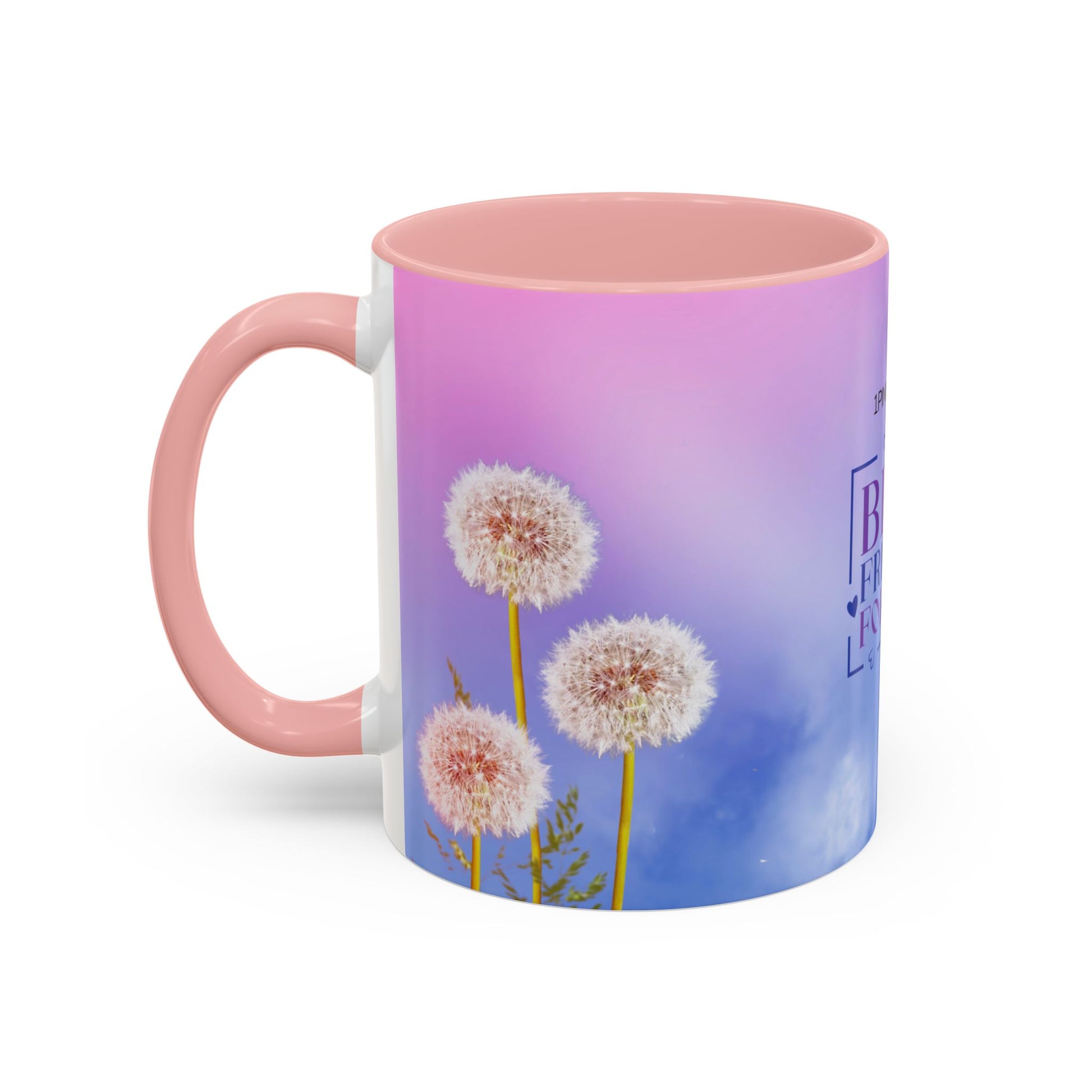 mug with a pink handle and a picture of dandelions