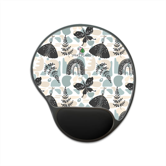 picture of a mouse pad with wrist rest and butterflies design