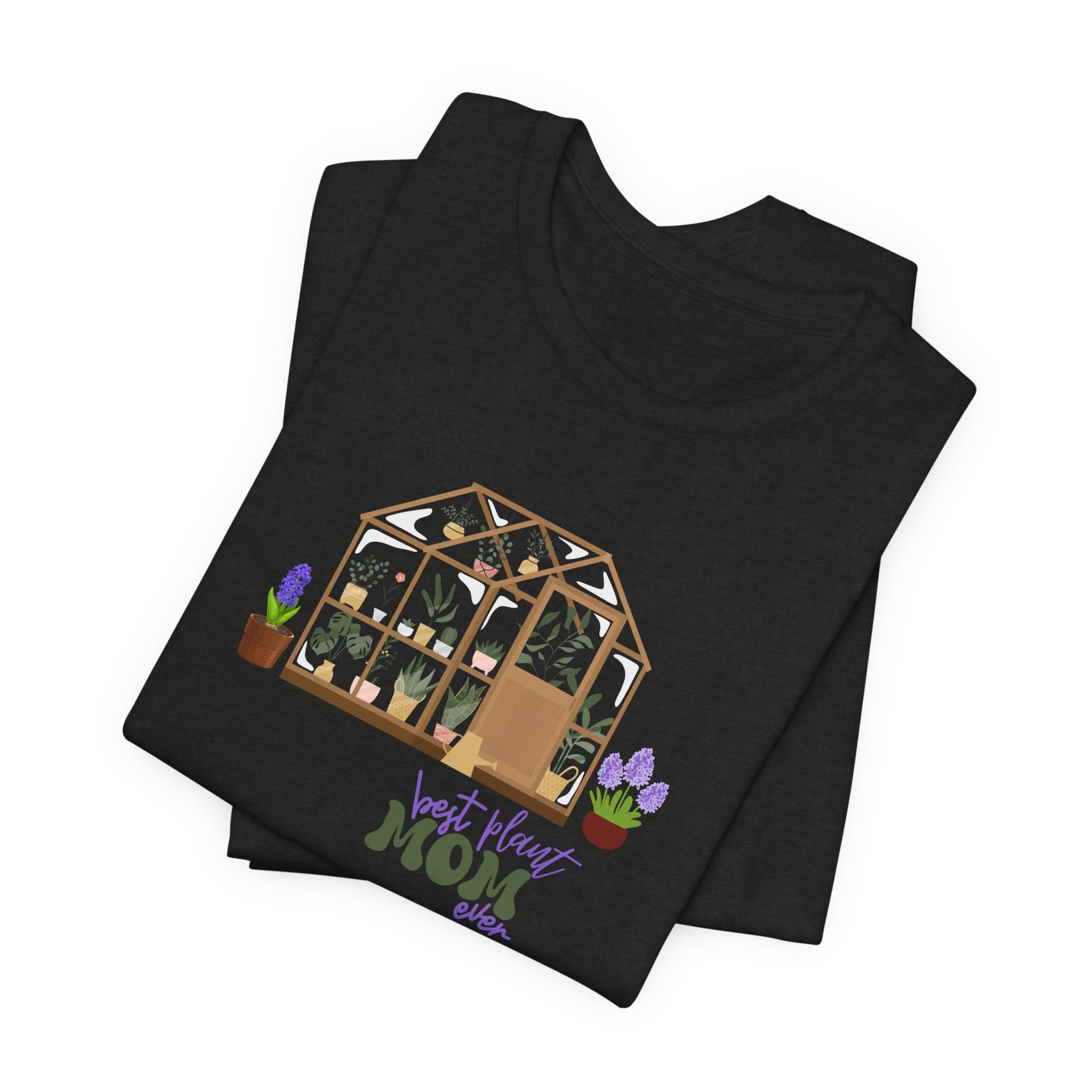 a folded black shirt with a greenhouse design and the words "best plant mom ever."  This tee shirt makes an excellent gift for moms that don't have kids but have plants.