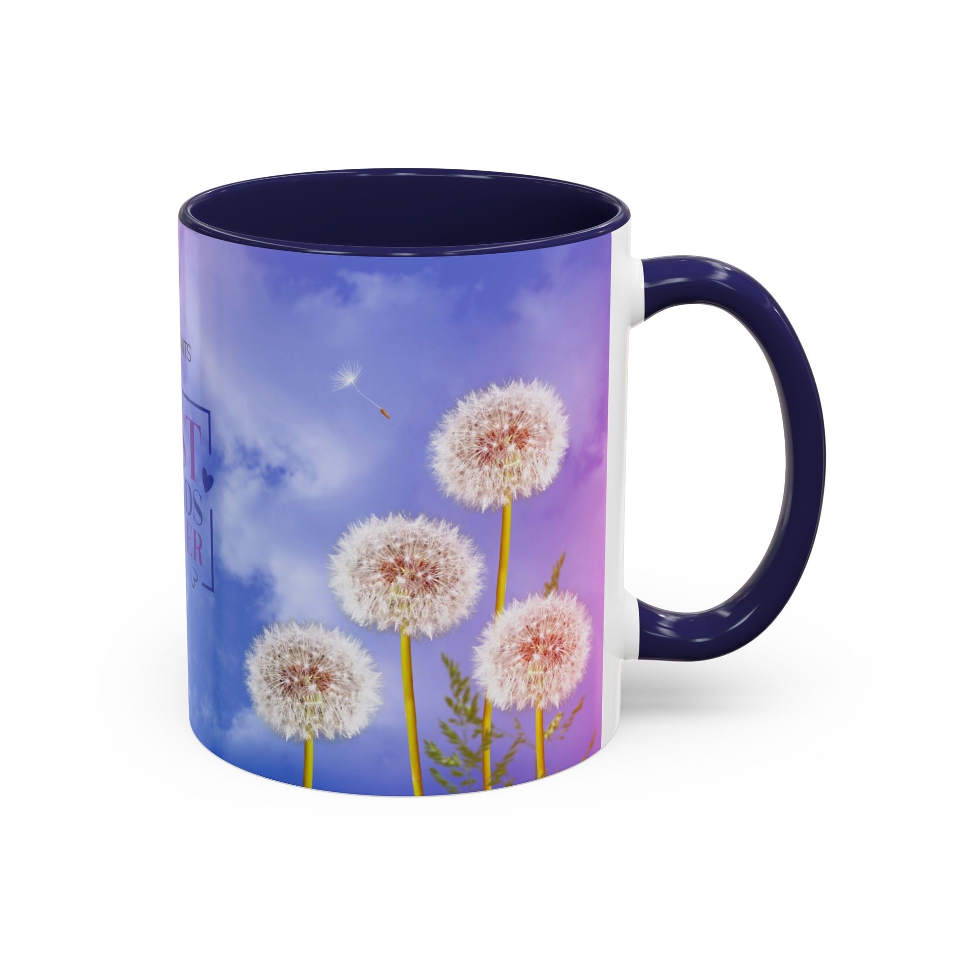 mug with navy blue handle and dandelions