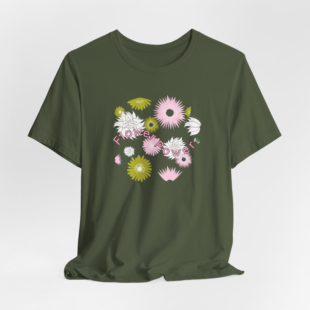 A military green color tee shirt with the words flower power in pink.  There are also pink, white, and green flowers printed on the shirt. 