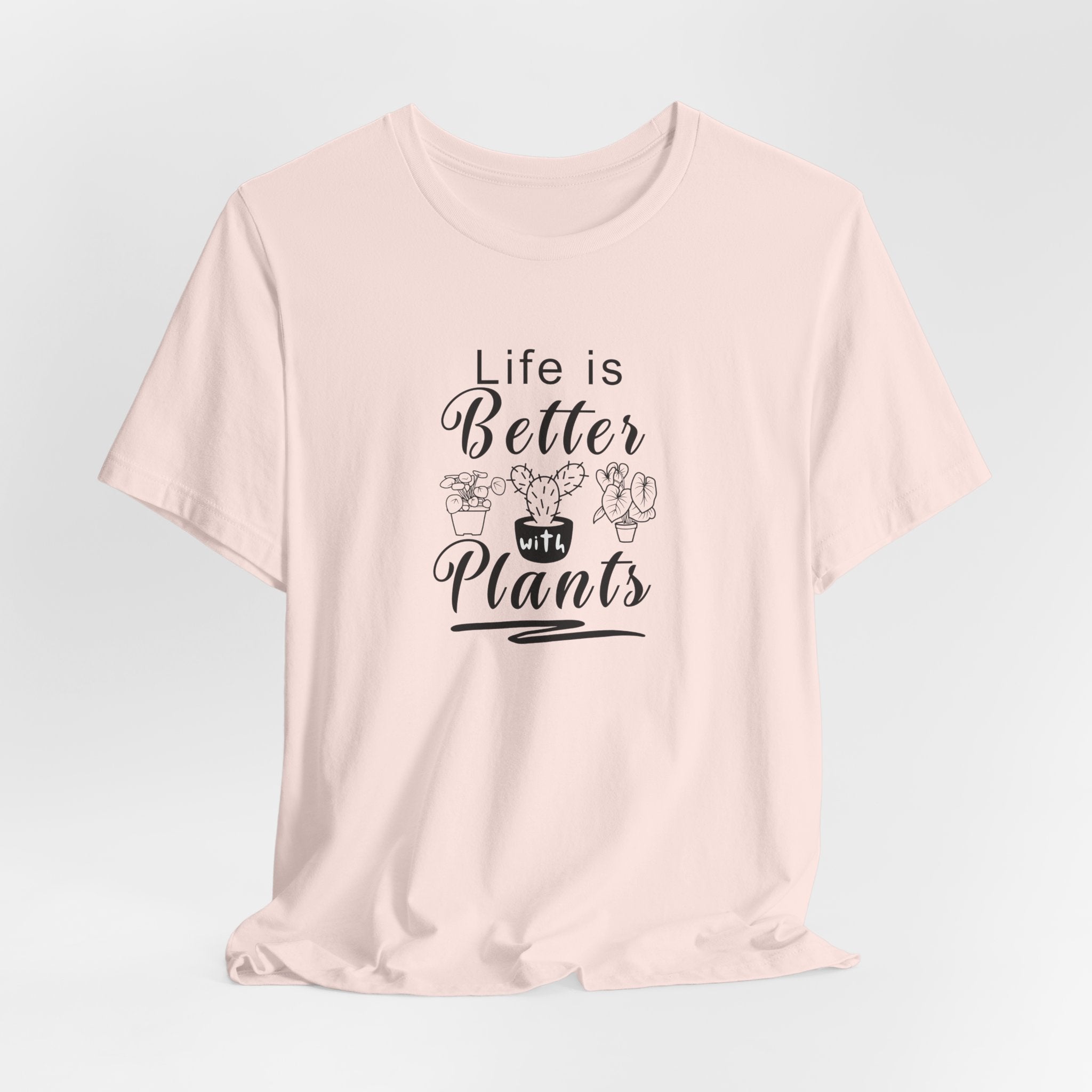 a pink shirt with "Life is Better with Plants" text in black  