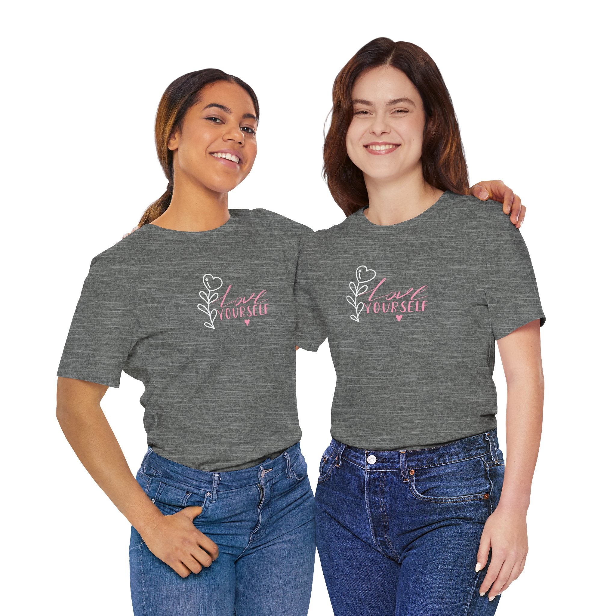 two college students wearing a gray shirt with the words "love yourself"