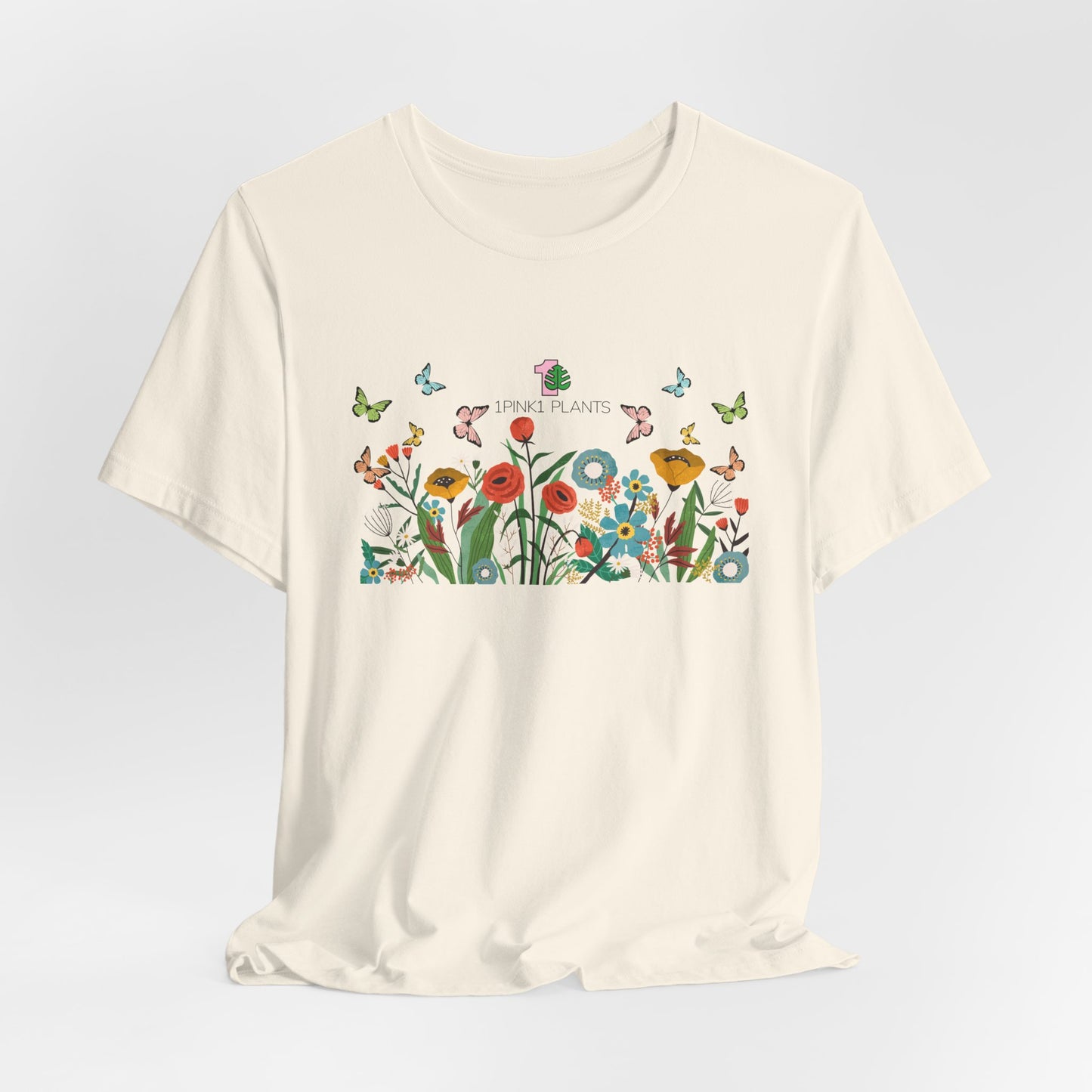 A gardening shirt with flowers and butterflies. 