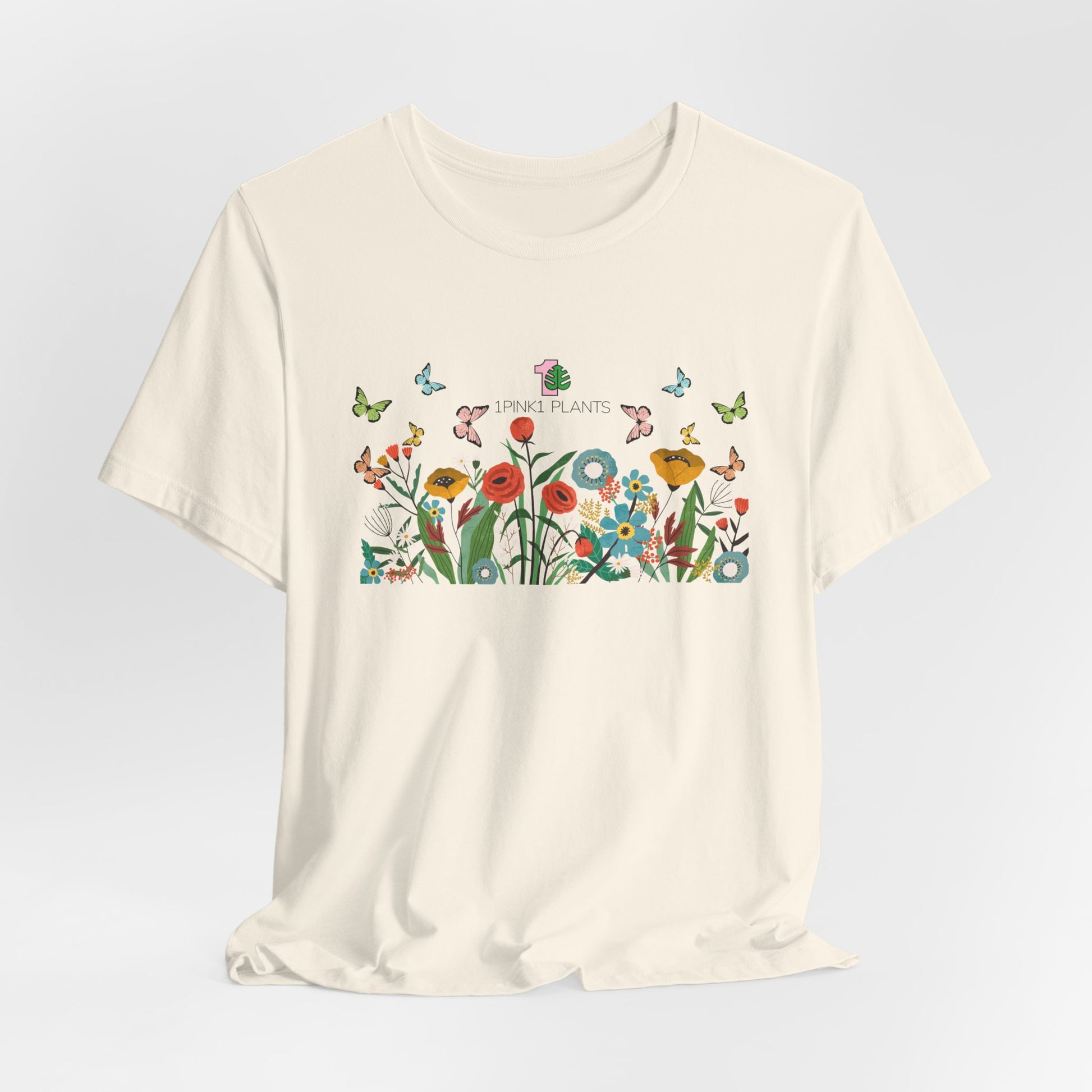 A gardening shirt with flowers and butterflies. 