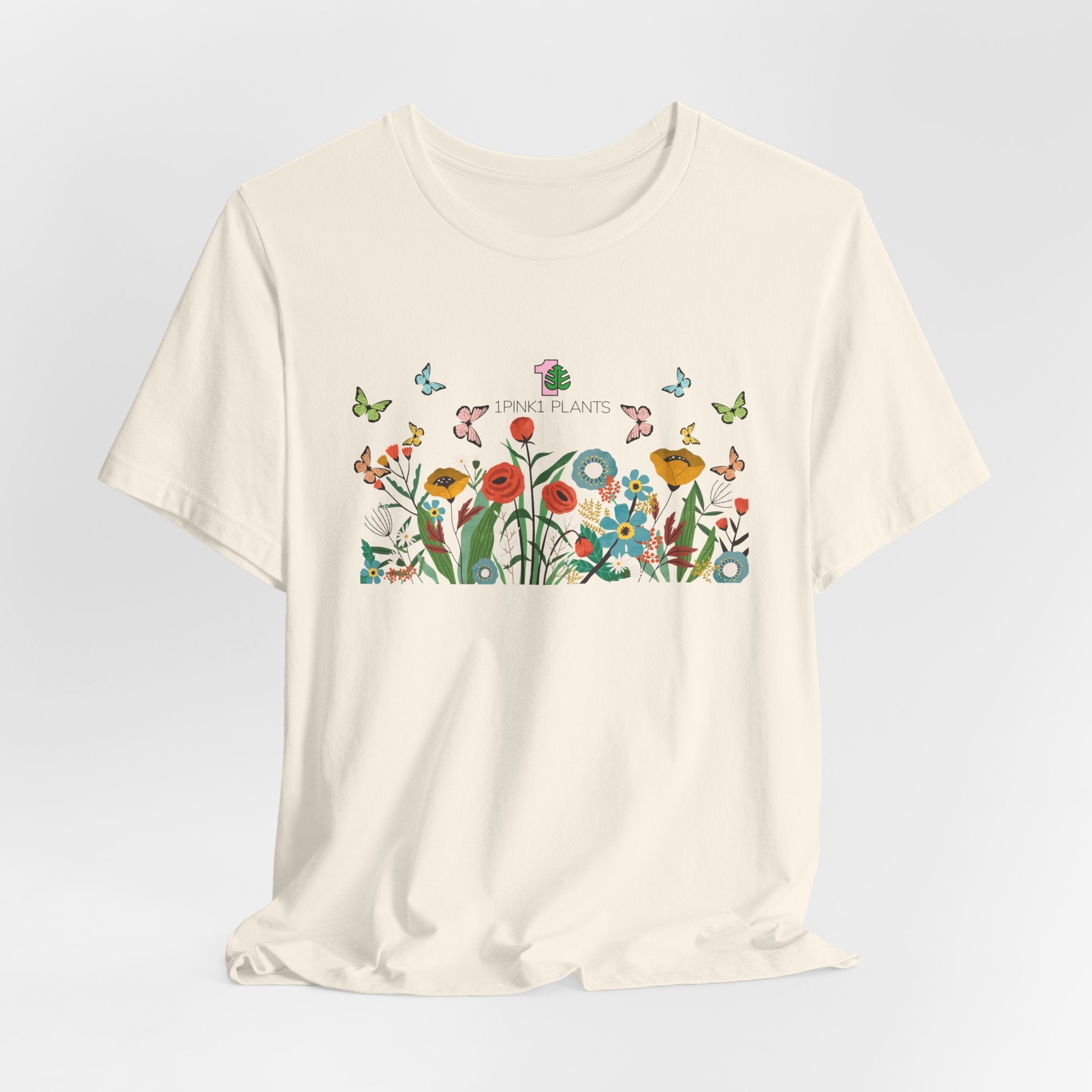 A gardening shirt with flowers and butterflies. 