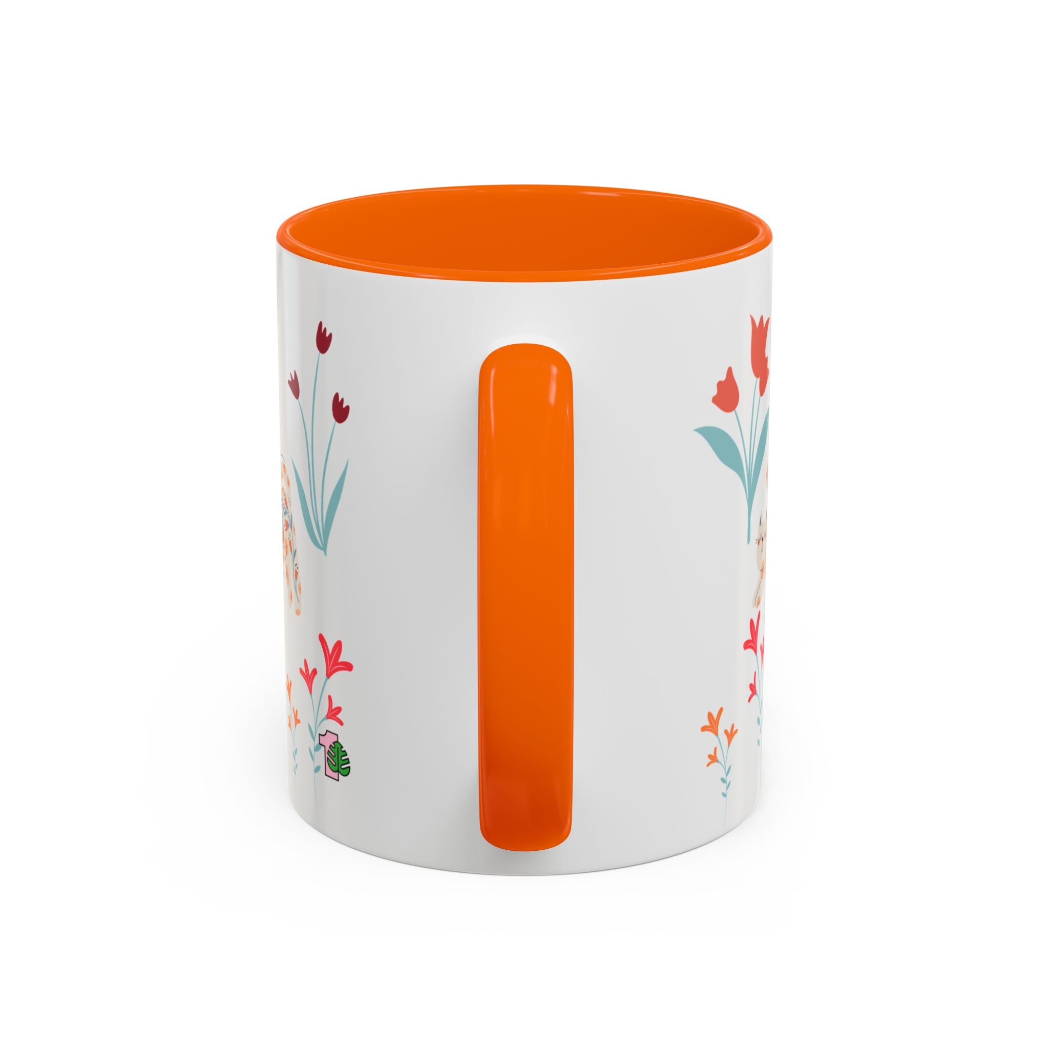 White mug with orange interior and handle, featuring floral designs on a white background