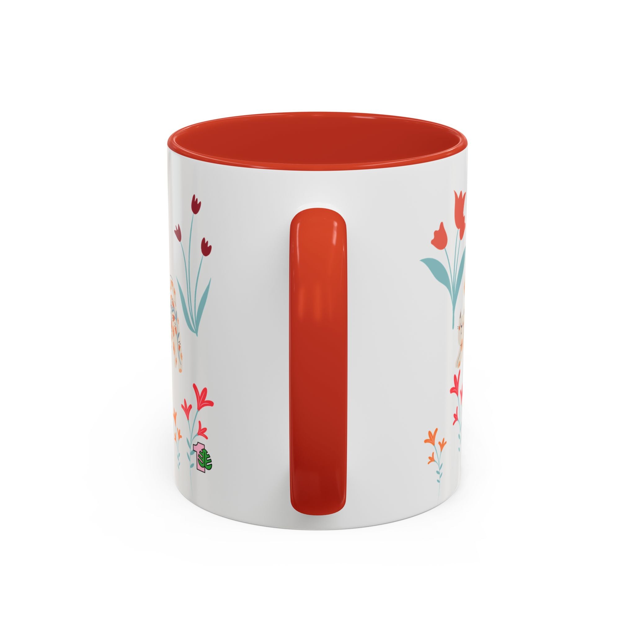 White mug with red interior and handle, featuring floral designs on a white background