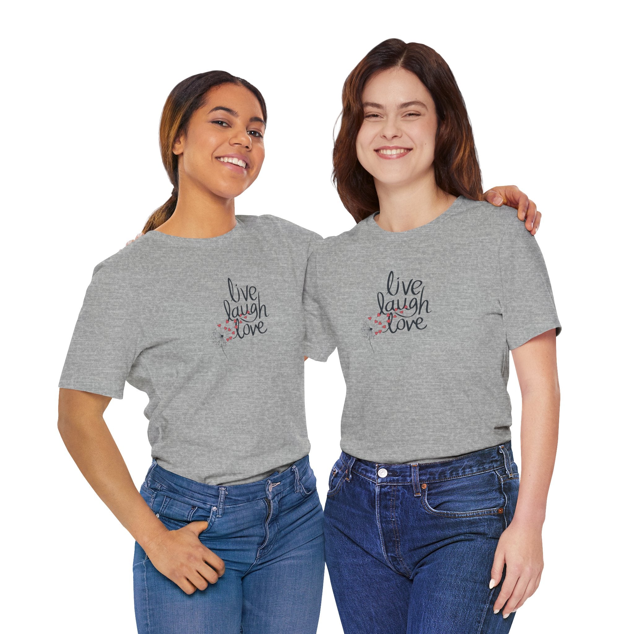 Two young ladies wearing a tee with text that says "live, laugh, love," and a dandelion with hearts.