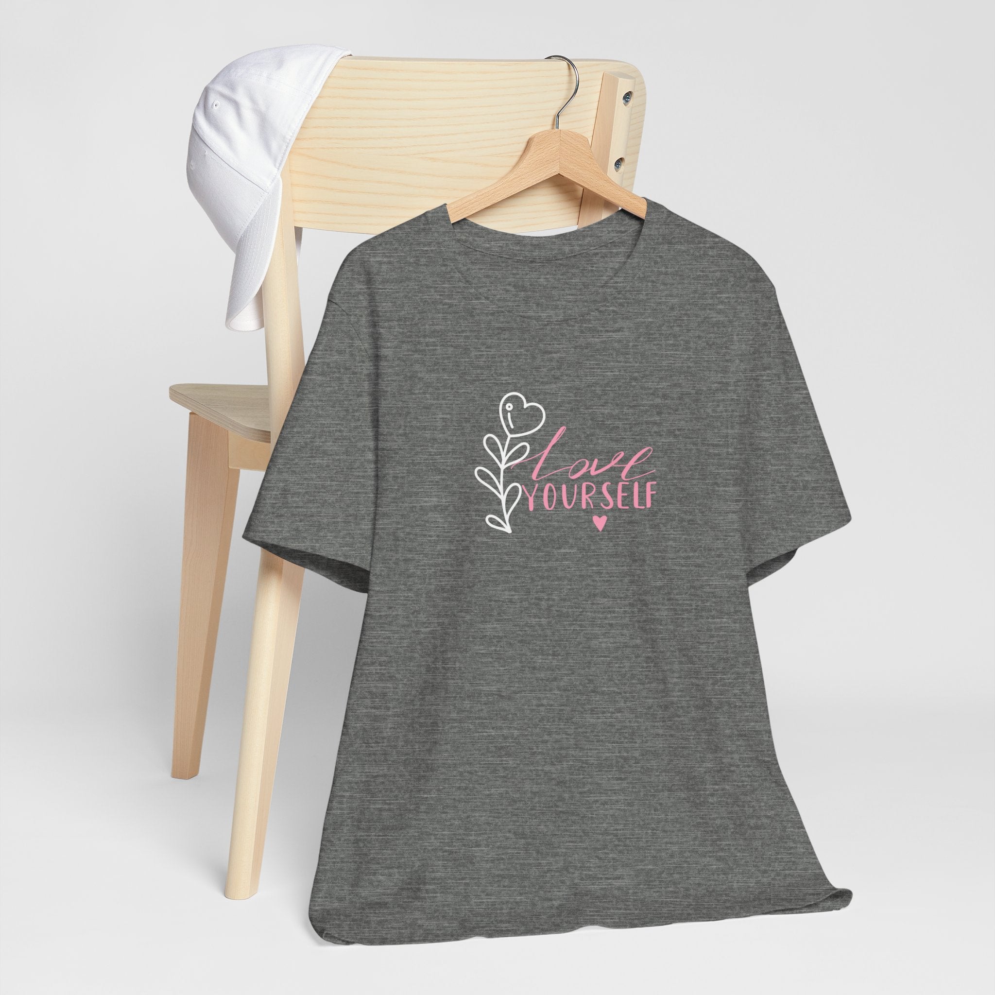 a gray shirt with the words "love yourself"