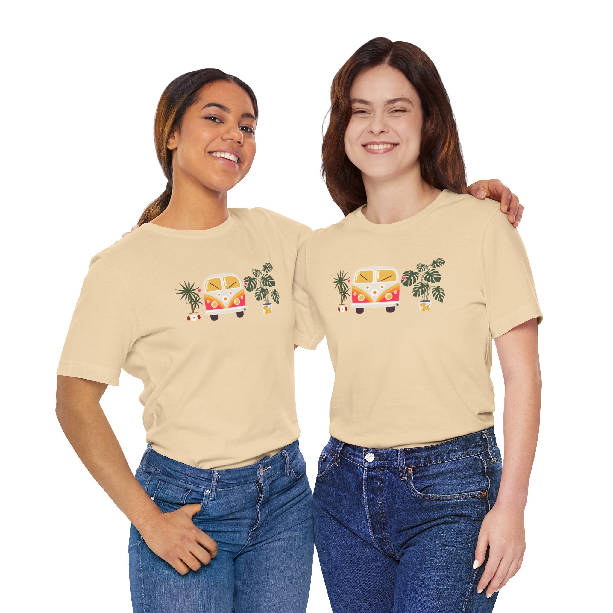 Two college students wearing a graphic tee with plant designs and a vintage buggy car. 