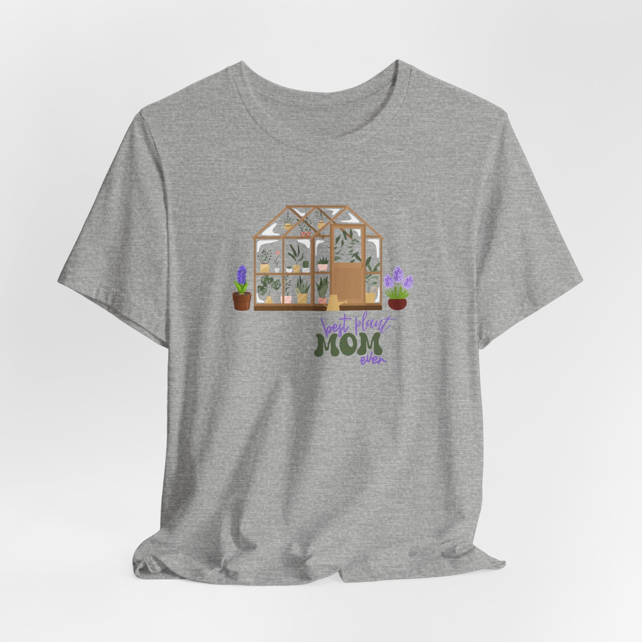 A Heather gray shirt with a greenhouse design and the words "best plant mom ever."  This tee shirt makes an excellent gift for moms that don't have kids but have plants.  A Mother's Day gift for women with no children.