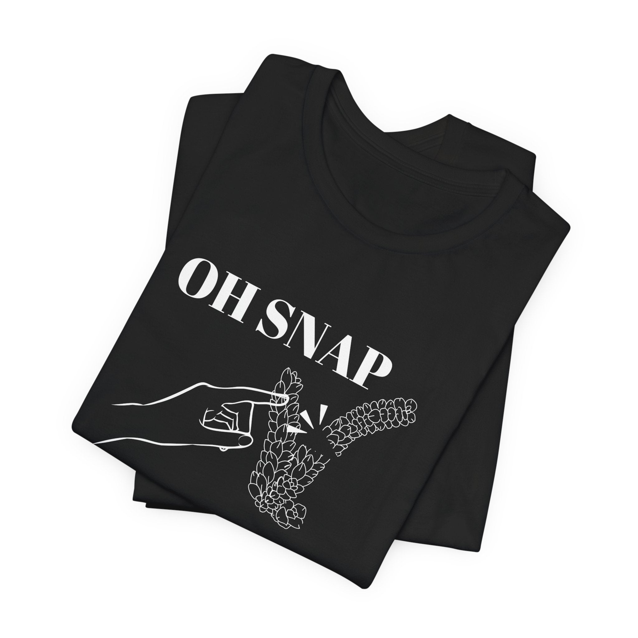 A folded black colored shirt with text that says "Oh snap" "free plant."  The shirt design also has a burro's tail plant snapped in half and a finger pointing to it. The shirt is an excellent gift for birthdays and Christmas. House plant collectors love this funny t-shirt.