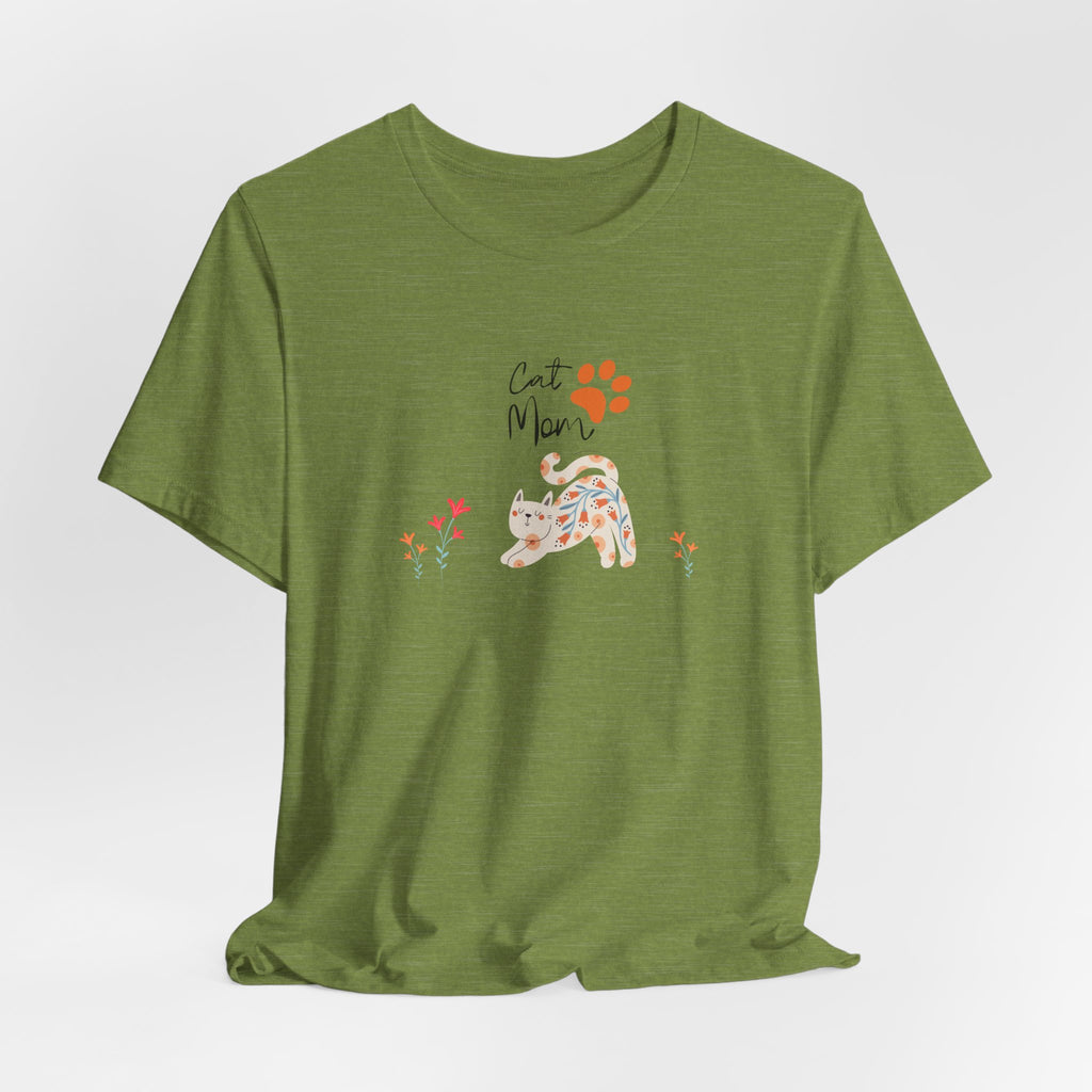 A heather green t-shirt with the words "cat mom," a floral cat, and some flowers printed on the front of the shirt.