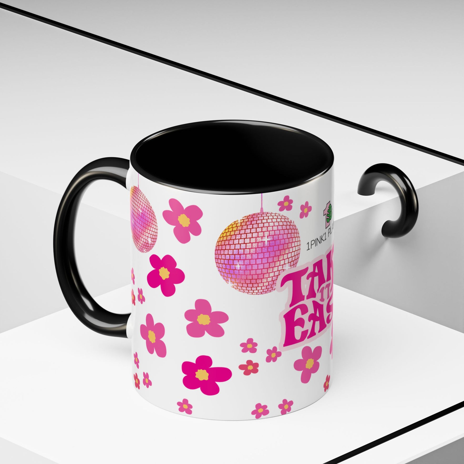 mockup of mug with disco ball and pink flowers 