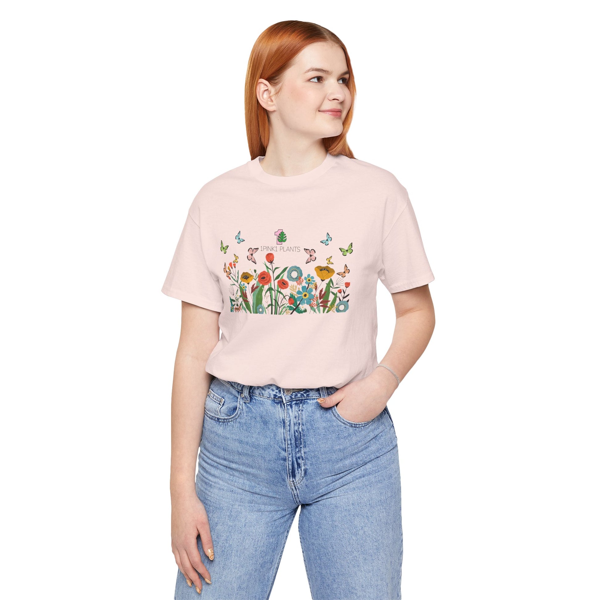 a young women wearing a soft pink gardening shirt