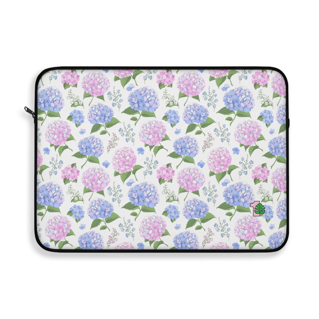 Floral patterned laptop sleeve with hydrangea design on a white background