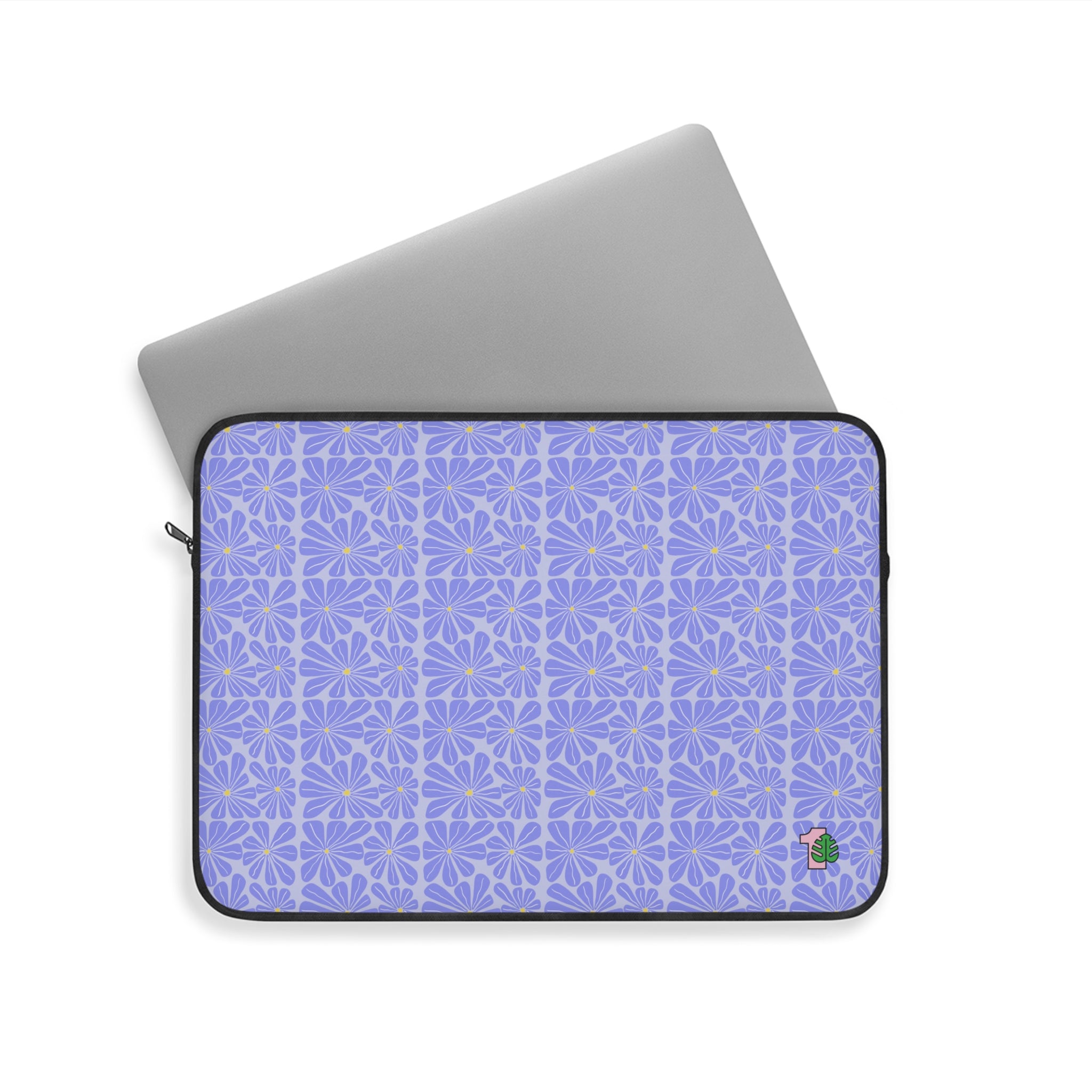 Laptop sleeve with purple geometric pattern on a white background