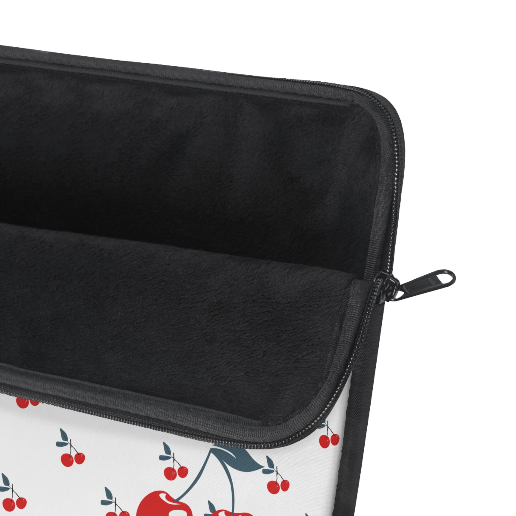 Black laptop case with a fruit pattern on a white background