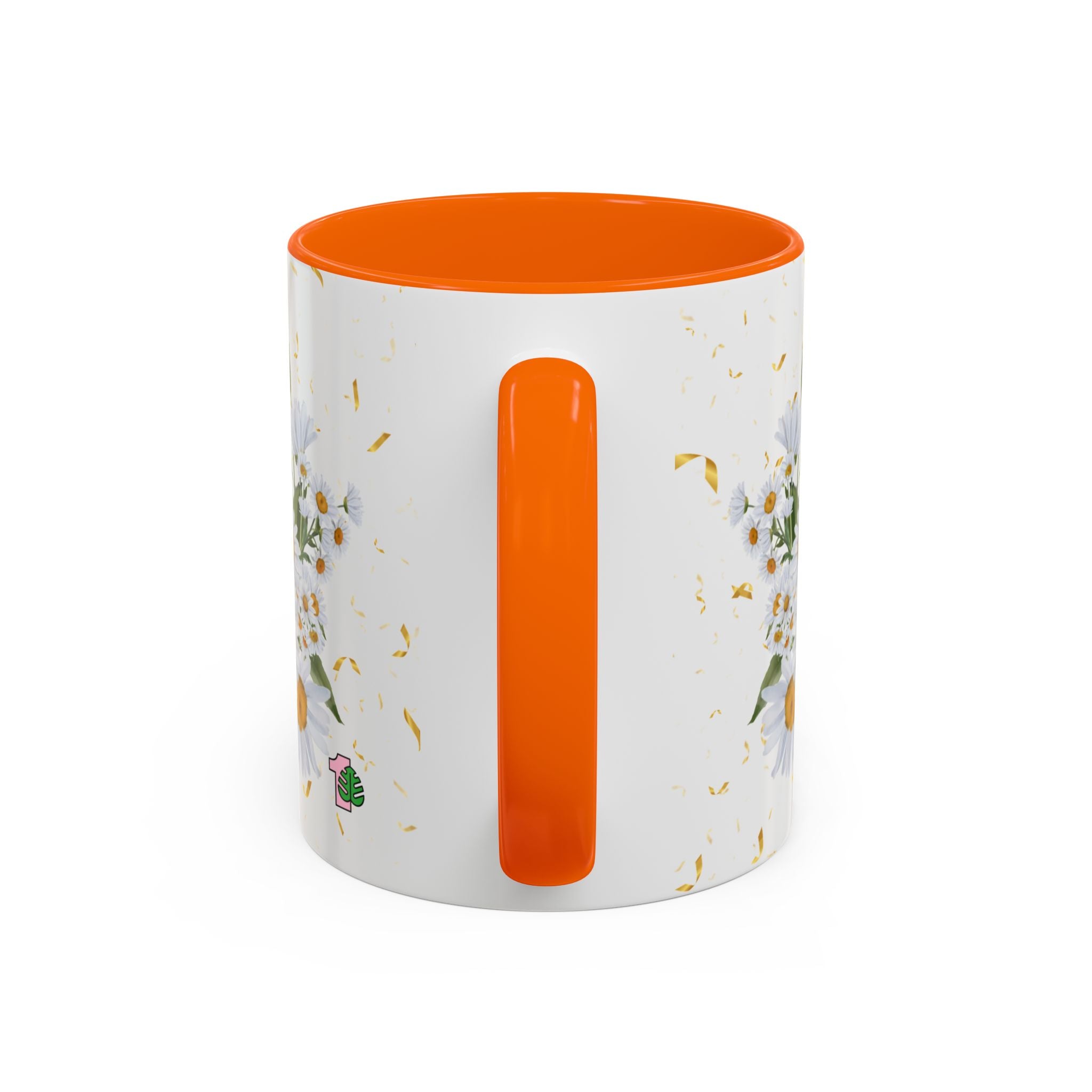 White mug with orange handle and interior, floral design on a white background
