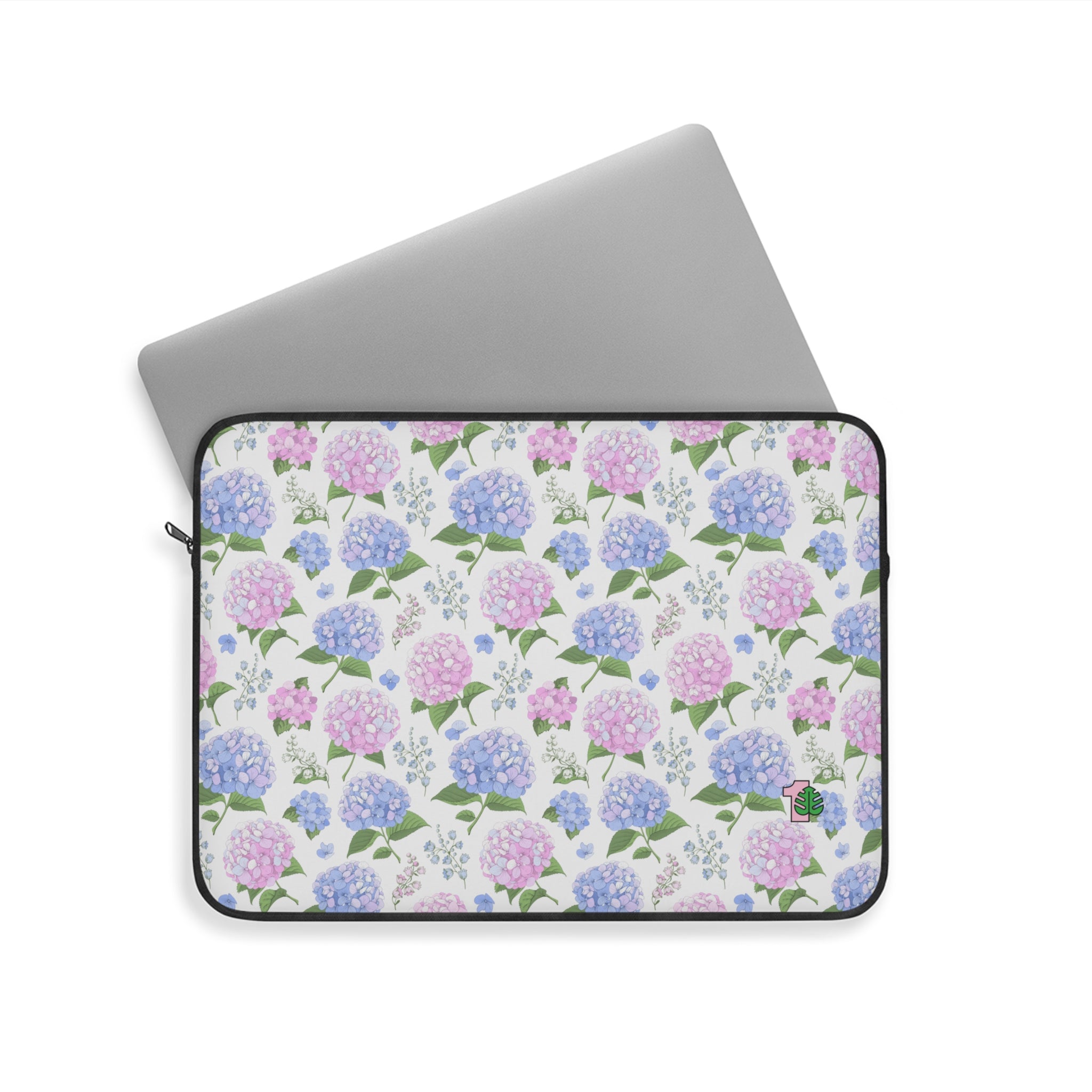 Laptop sleeve with floral pattern on a white background