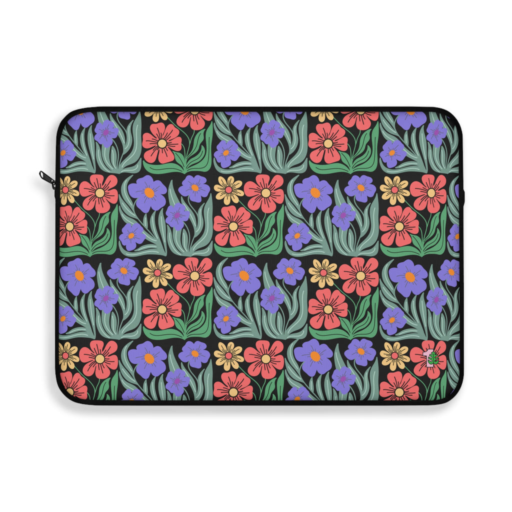 Floral patterned laptop sleeve with colorful flowers on a black background
